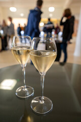 Tasting of brut champagne sparkling wine during visit caves in champagne house in Reims, France