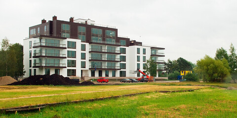 Fototapeta premium A new large residential building outside the city