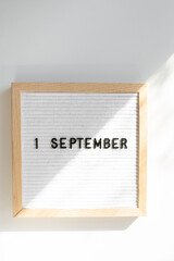 Text 1 September in letter board
