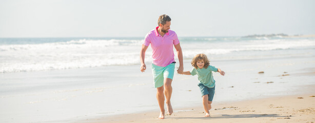 cheerful kid and dad running on beach in summer vacation together, activity