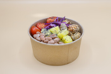 Vegeterian seafood bowl with smoked salmon, shrimp, avocado in take out paper container. Close up, copy space, top view, background.