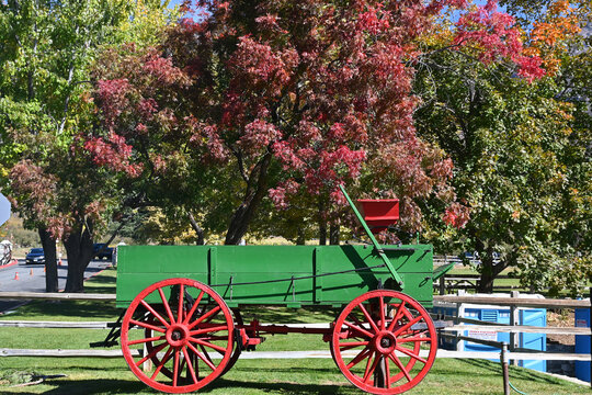 OAK GLEN, CALIFORNIA - 10 OCT 2021: Colorful wagon and Fall Foliage at the entrance to Los Rios Rancho, Southern Californias largest Apple Farm.
