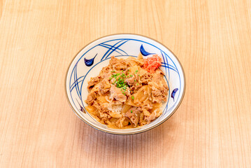 Gyudon is a beef bowl, it is a Japanese cuisine dish consisting of a bowl of rice covered with minced beef and onions previously soaked in a sweet sauce seasoned with soy sauce and mirin