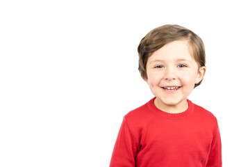 Cheerful laughing child in red sweater.