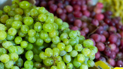 Ripe grapes on the stalls at the supermarket