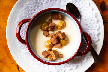 Cream cheese flan with praline and brownie cubes