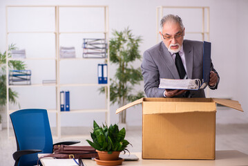 Old male employee in dismissal concept