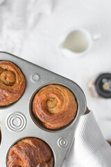 Flaky morning buns in a cupcake pan, laminated morning rolls, danish pastry in a cupcake pan