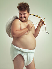 He's bringing the love this Valentine's. An obese man dressed as a cherub with a bow and arrow.