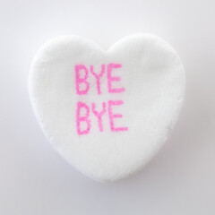 Conversation hearts on white background flat lay.