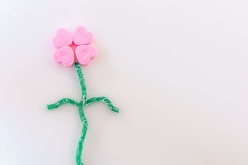 Conversation hearts on white background flat lay.