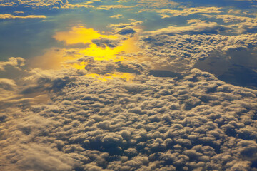Fantastic cloudscape view from above . Flight over the clouds with sunlight
