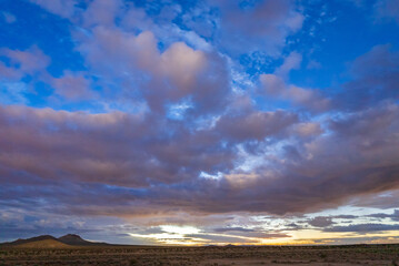 Colorful Storm clouds over the Mojave Desert At sunrise