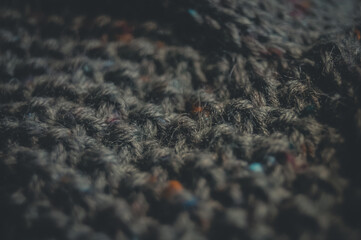 Texture wool sock. Natural yarn made of wool. His hobby is hand knitting. Selective focus