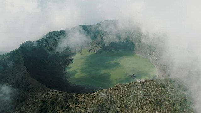 Crater and Green Sulfur Lake of El Chichonal Volcano in Chiapas, Mexico - aerial drone shot