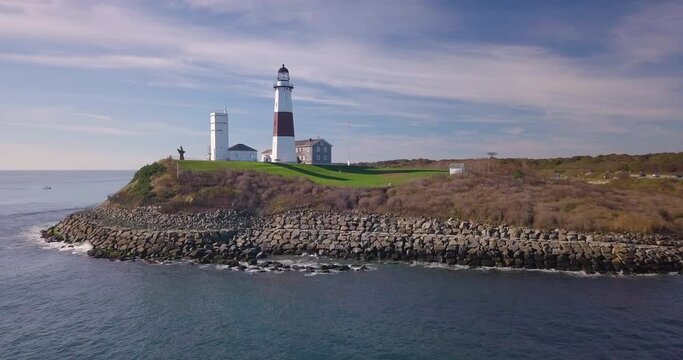 Aerial view of the Montauk Point Light lighthouse in East Hampton on an idyllic summer day.