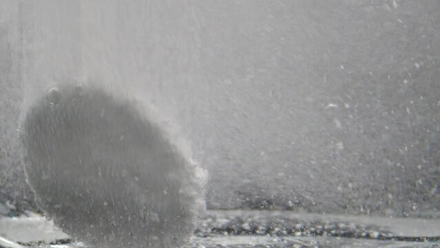 Close-up of effervescent painkiller being dissolved in water