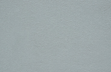 Texture of modern concrete wall with soft light green and copy space for text backgrounds.