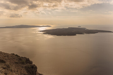View of small island at dusk from Santorini