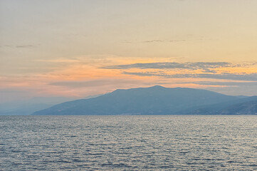 Dusk over the Argolic Gulf with mountains in the background