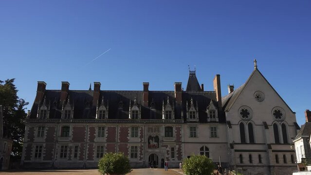 Blois Chateau with tourists entering and sightseeing historical site slow motion 4k 30p