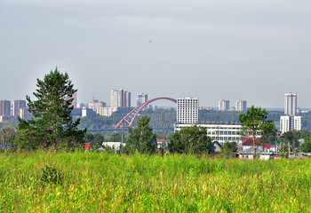City among the fields in summer