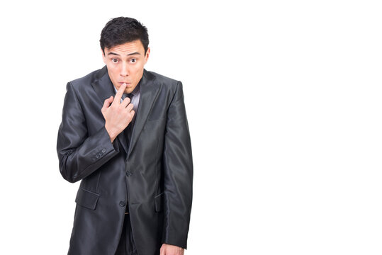 Ashamed man in formal suit feeling guilt