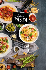 Pasta assortment on dark background.