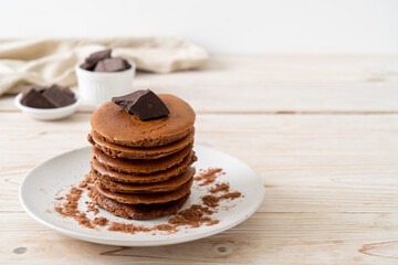 chocolate pancake stack on plate