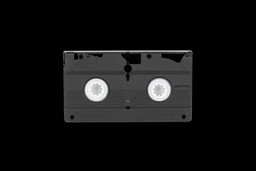VHS videotape is isolated on a black background rear view
