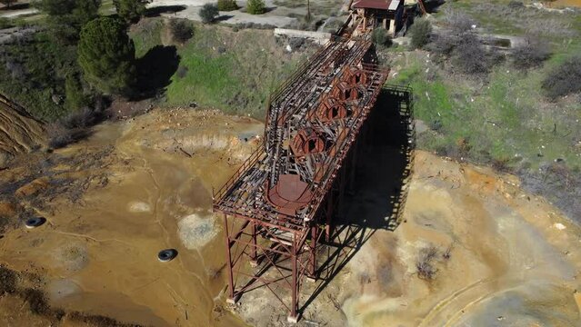 Aerial footage of the rusted structures at the old Mitsero copper mines.