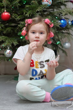 a little girl is painted on the background of a Christmas tree