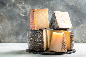 various types of Spanish manchego cheese made from cow and goat milk. International dairy delicacies