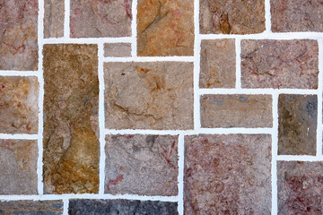 Background from a stone wall made of rectangular bricks