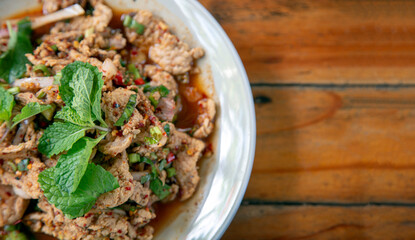 Spicy Northeastern Thai food full of herbs.