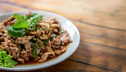 Spicy Northeastern Thai food full of herbs.