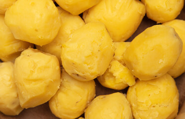 Boiled potatoes in a saucepan.