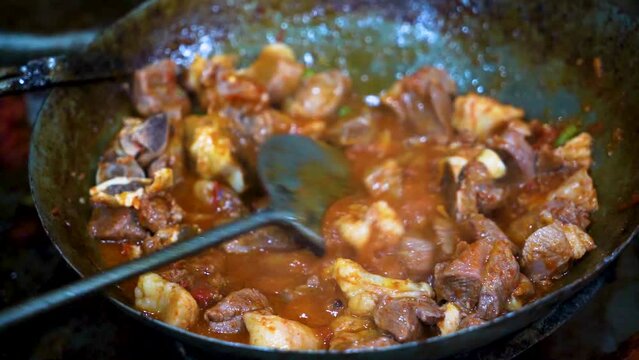 Traditional karahi of mutton at charsi tikka shop, Peshawar, Pakistan