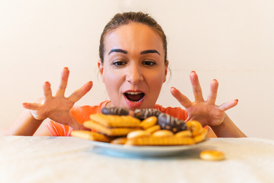 Woman Wants To Eat Sweets. Diet And Proper Nutrition