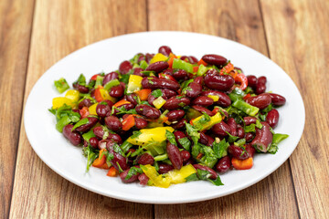 Mexican Bean Salad. Homemade black bean served in a ceramic plate, selective focus