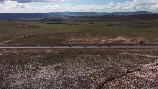 Lateral aerial shot of the Troncal 10 highway, which crosses the entire Gran Sabana in Venezuela