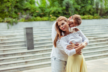 Romantic portrait of a couple in love spending time together in a city park