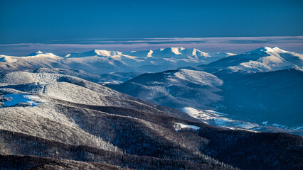 Winter mountain landscape. Bieszczady Mountains and Polonina Borshava, Poland. and Ukraine.