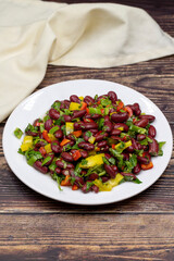 Mexican Bean Salad. Homemade black bean served in a ceramic plate, selective focus