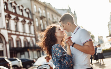 Relationship concept. Young couple in love spend time together in the city