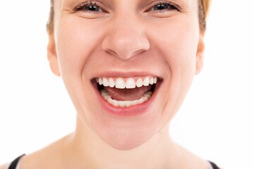 girl laughing smiling with teeth on a white background