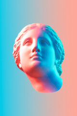 Gypsum copy of the ancient statue of Venus de Milo in pastel tone for artists on pink blue...