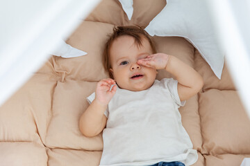 Portrait of a sleepy little baby girl
