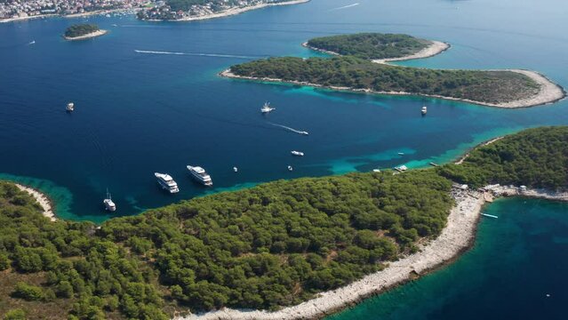 Charter Boats At Green Forest Island Of Paklinski Near Hvar City In Croatia. Aerial Wide