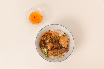Bun Thit Nuong, Vietnamese grilled pork with rice noodles, Vietnamese food isolated on white background, top view